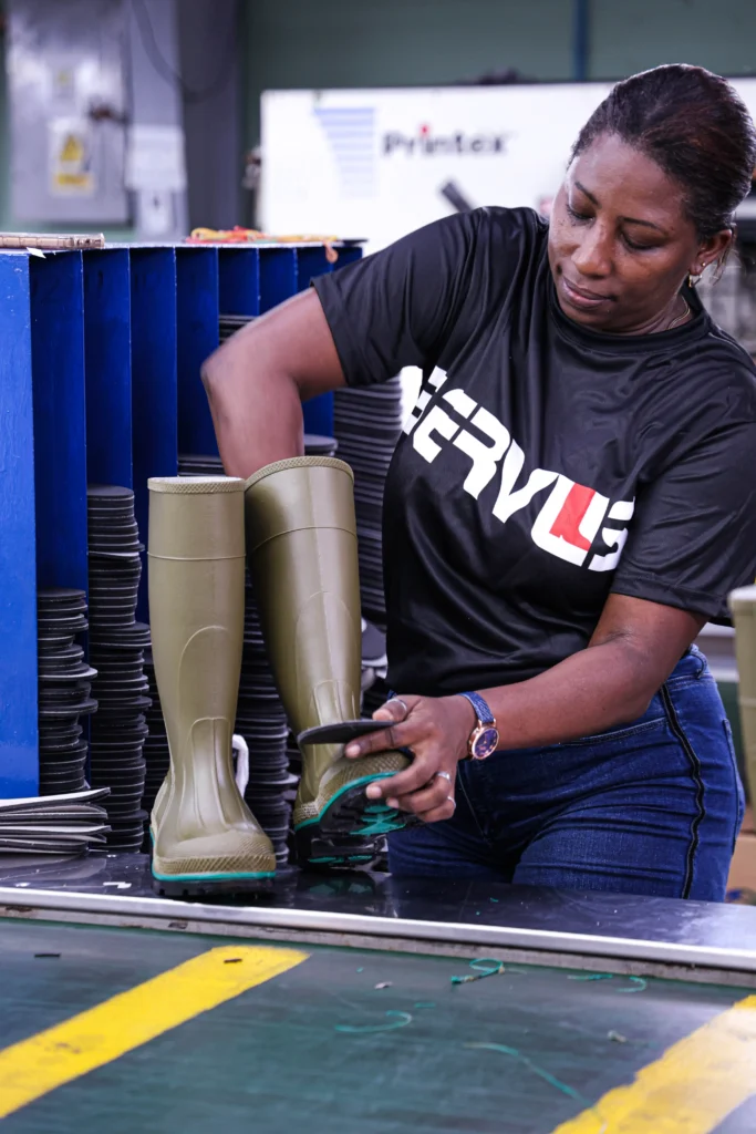 Servus factory Quality Control worker